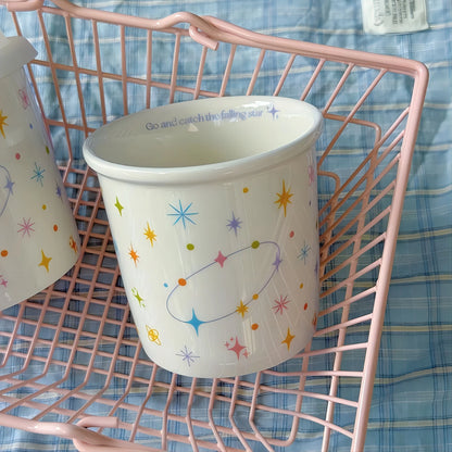 Colorful polka dot smiling face holding cup ceramic coffee cup