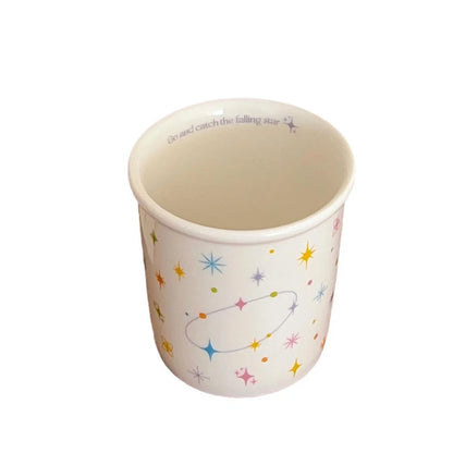 Colorful polka dot smiling face holding cup ceramic coffee cup